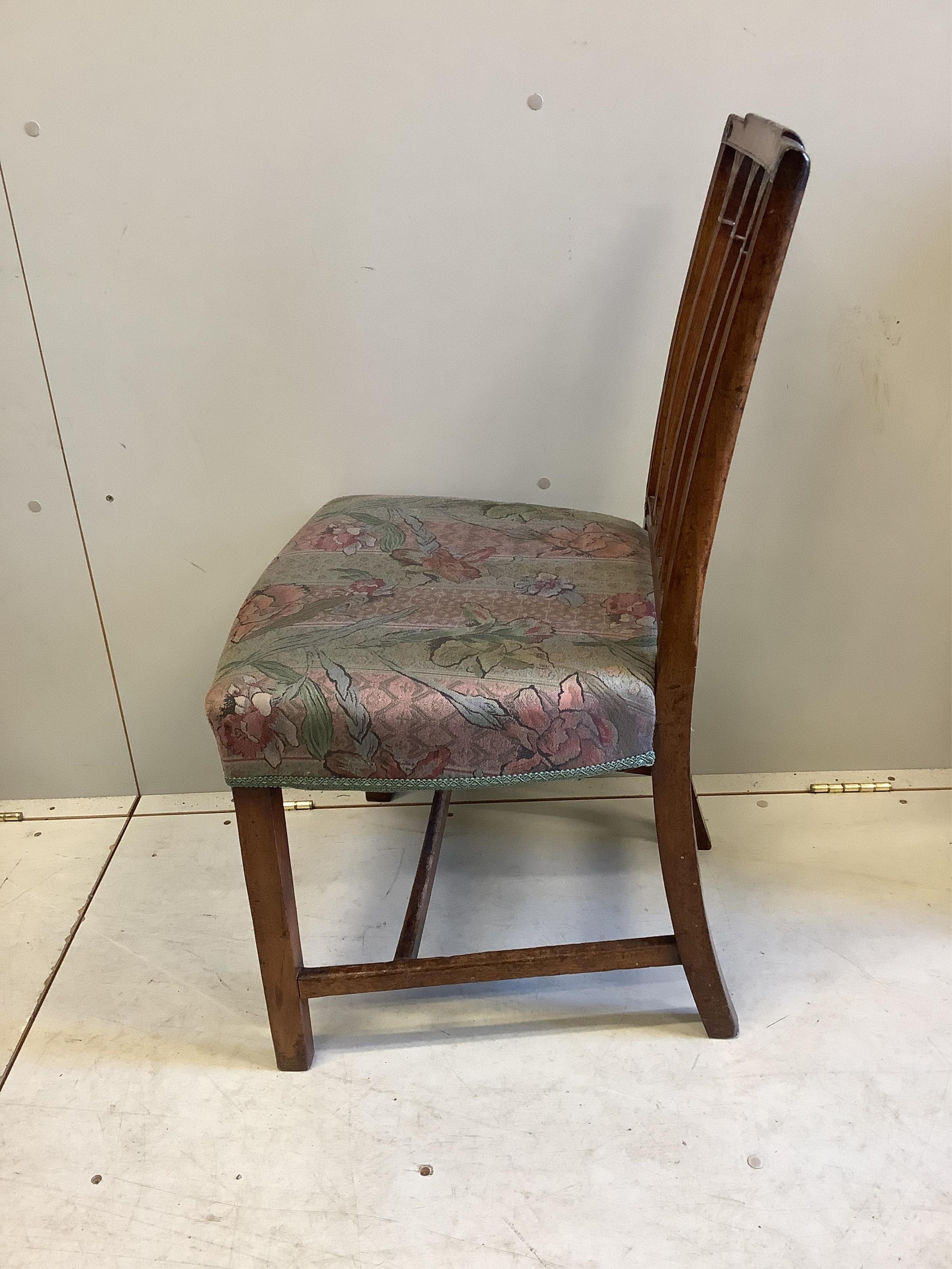 A set of six Sheraton style mahogany dining chairs (two with arms). Condition - fair